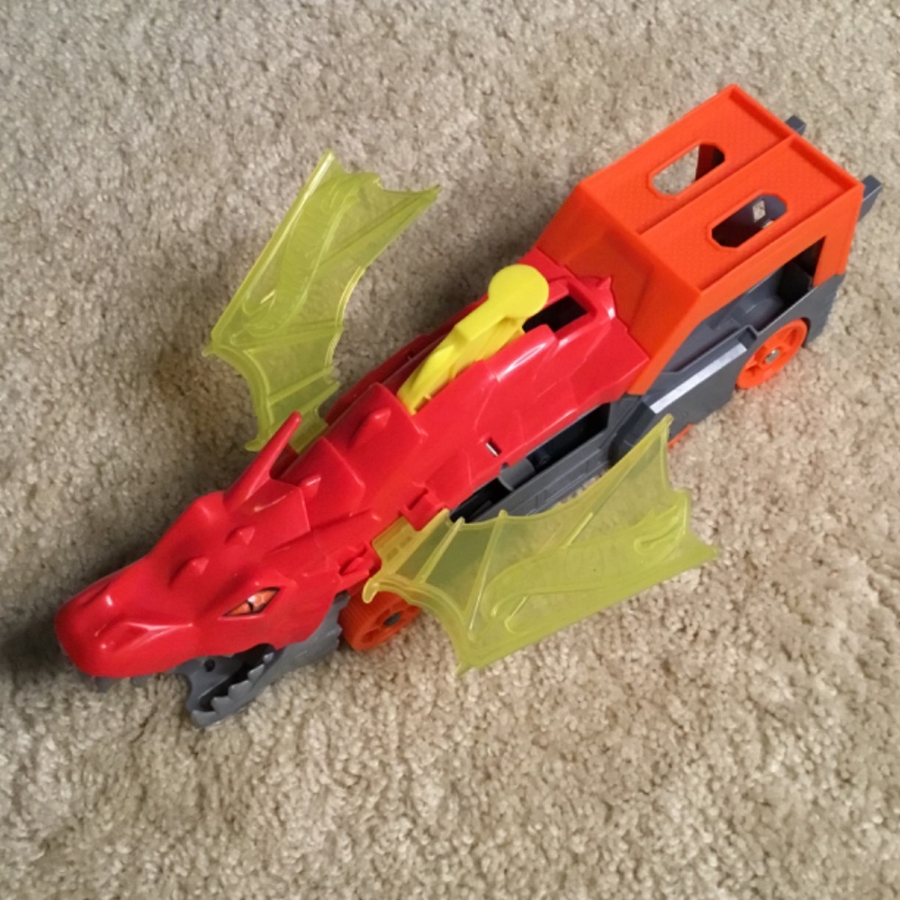 Dragon-Themed Toy Car with Red and Orange Accents